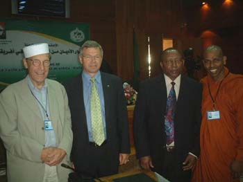 with retired Norway and Tanzania prime ministers and Finland foreign minister at IFAPA  meeting at Tripoli in Libya on August 2007.jpg
